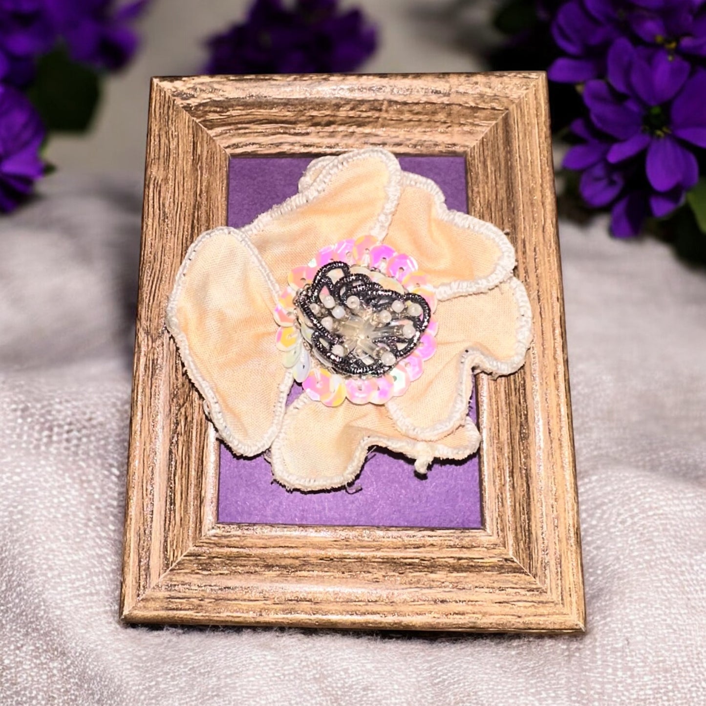 White framed stumpwork flower