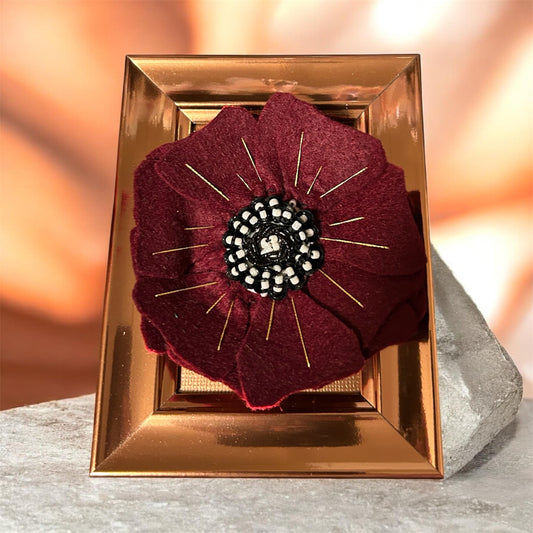 Burgundy felted flower