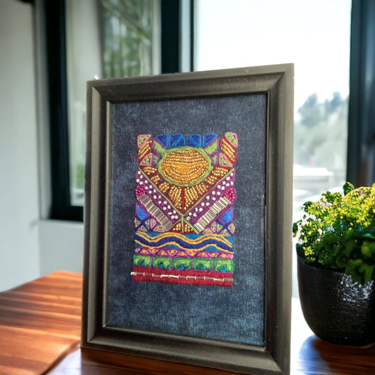 Framed geometric embroidery